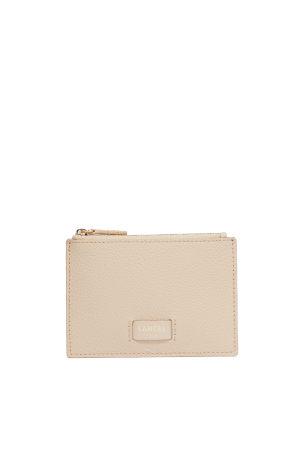 porte-cartes zippé Lancel Ninon en cuir grainé beige